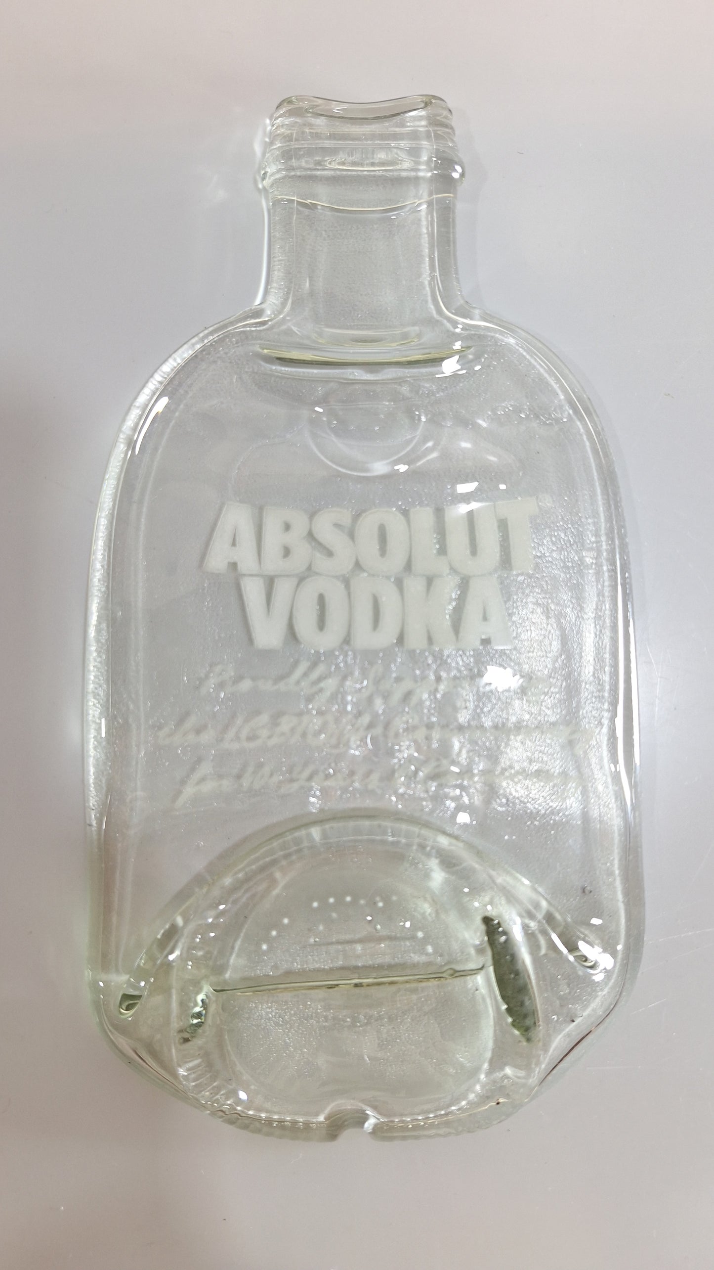 Plato de absolut plano