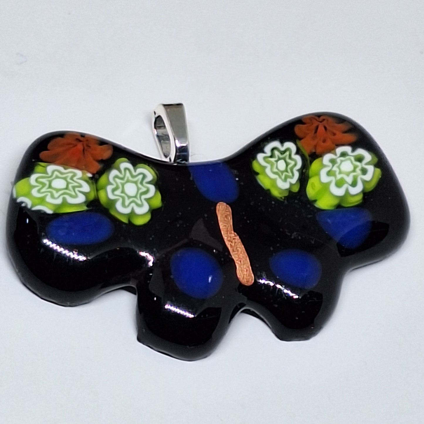 Mariposa con flores