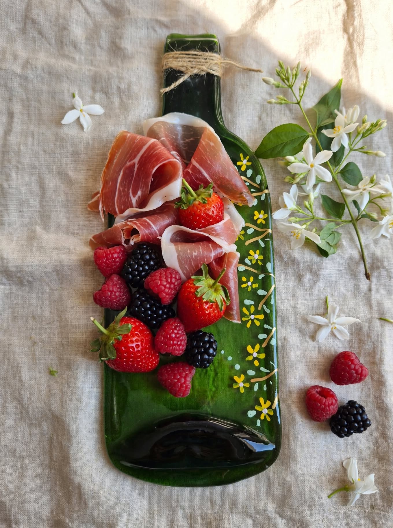 3 platos de botella flores
