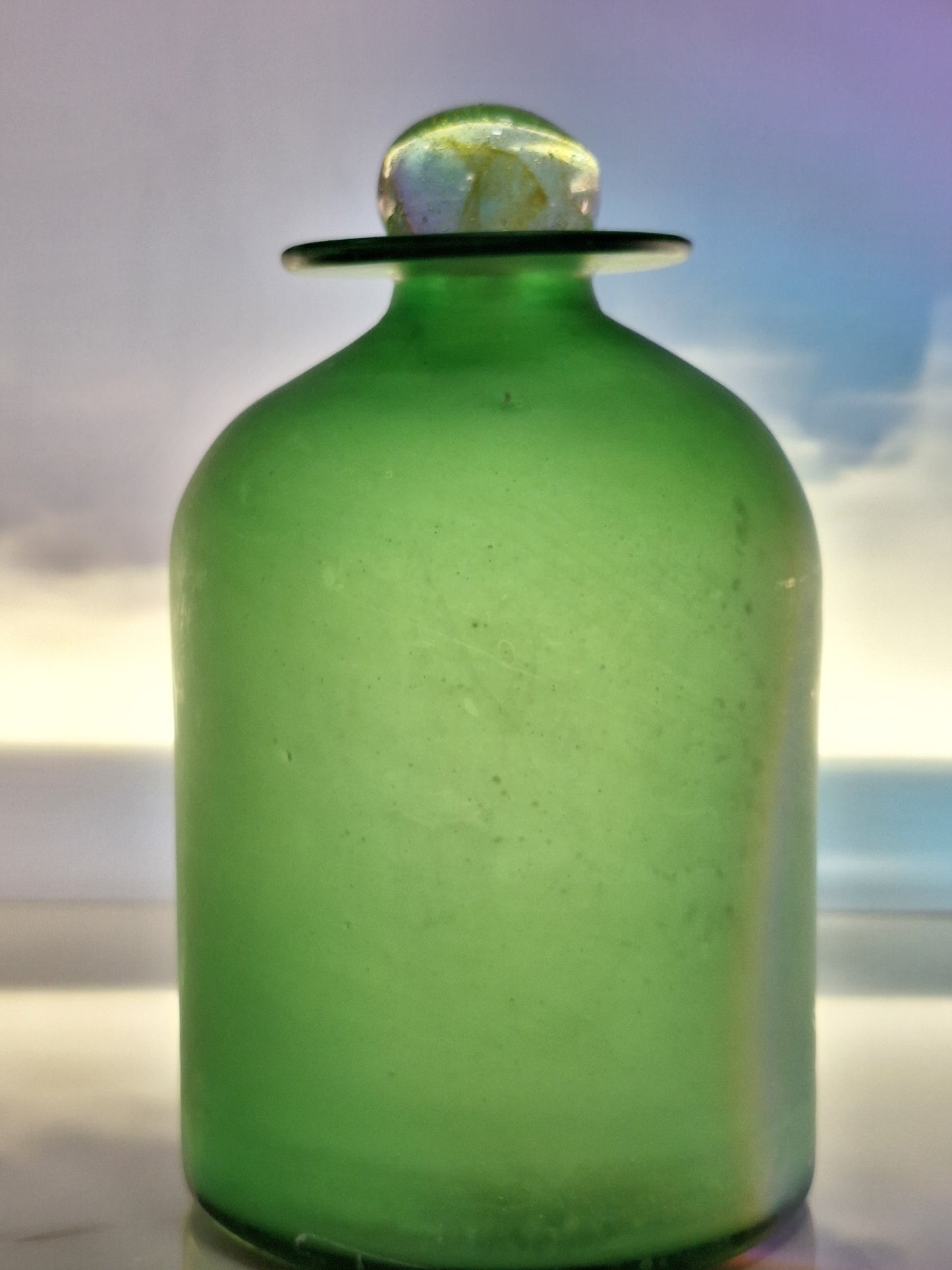 Botella de con tapa redonda